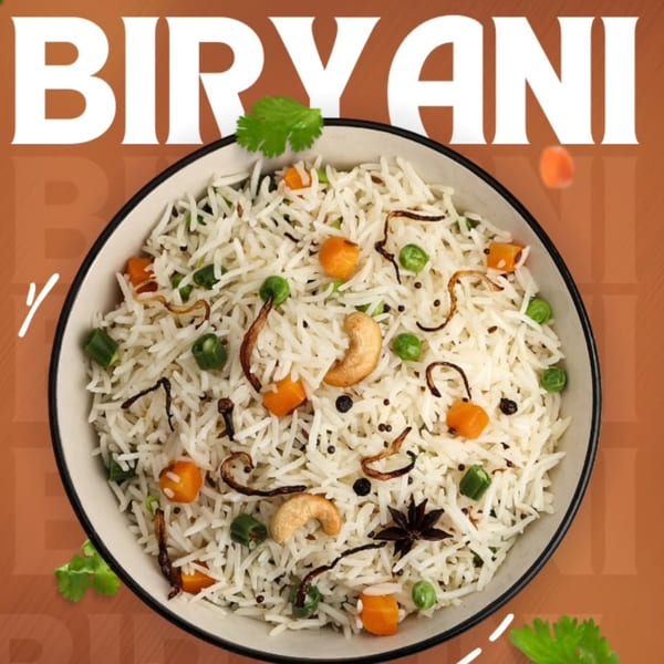 A bowl of Bawarchi Biryanis' Indian biryani with rice, vegetables, cashews, and spices.